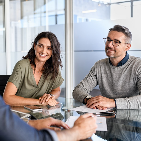 couple meeting with doctor at table